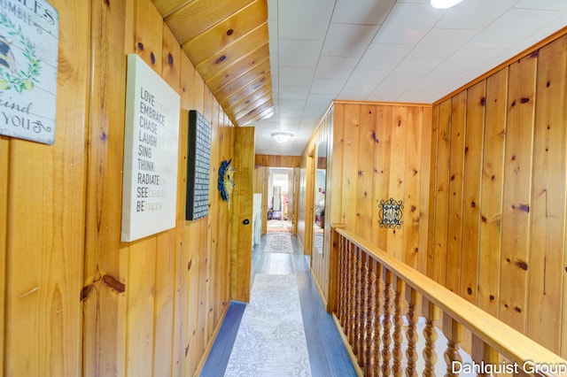 1573 N Whitehall Rd, Muskegon, MI 49445 - corridor with wood walls and wood finished floors
