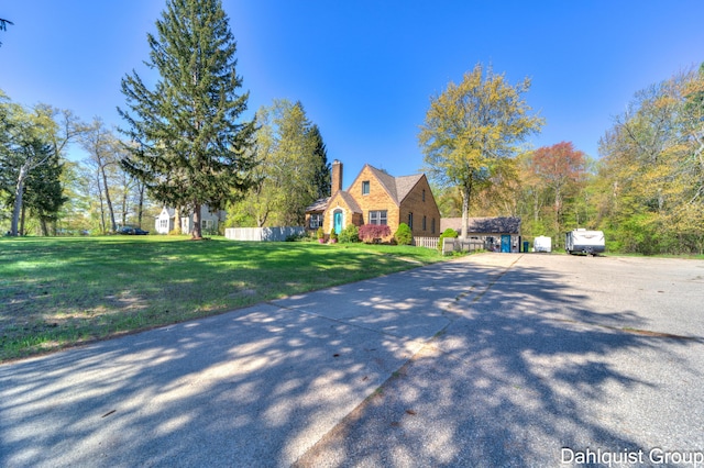 1573 N Whitehall Rd, Muskegon, MI 49445 - view of front of house featuring a chimney