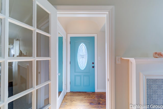 1573 N Whitehall Rd, Muskegon, MI 49445 - foyer entrance featuring wood finished floors and french doors