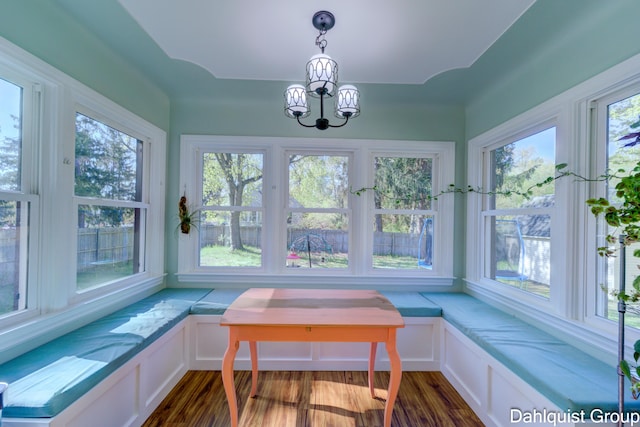 1573 N Whitehall Rd, Muskegon, MI 49445 - sunroom featuring plenty of natural light and a chandelier