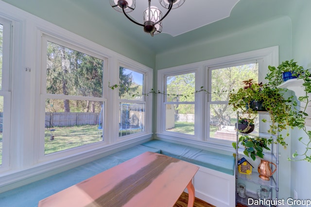 1573 N Whitehall Rd, Muskegon, MI 49445 - sunroom / solarium featuring a chandelier and healthy amount of natural light
