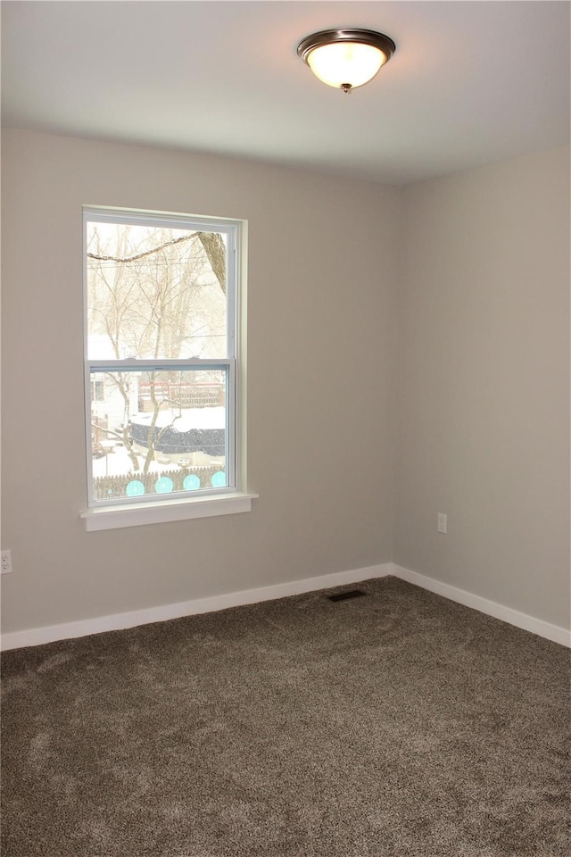 00 High Slope Dr, Brighton, MI 48114 - carpeted spare room featuring plenty of natural light and baseboards