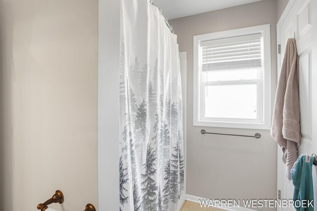 11774 Tyler St, Holland, MI 49424 - bathroom featuring a shower with curtain