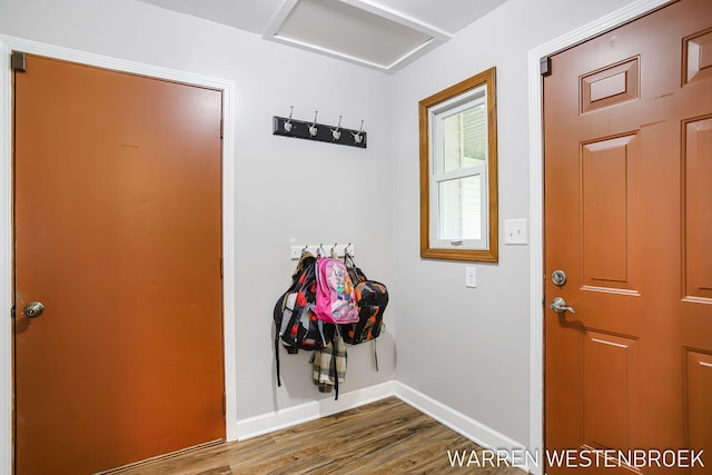 11774 Tyler St, Holland, MI 49424 - doorway to outside with wood finished floors and baseboards