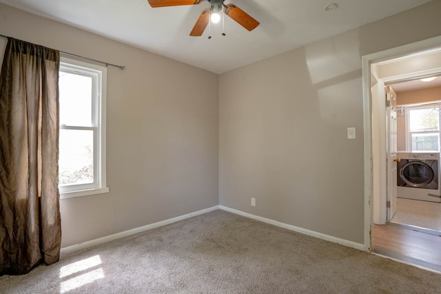 29255 Rymal St, Roseville, MI 48066 - carpeted spare room with washer / dryer, baseboards, and a ceiling fan