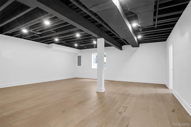 227 W Houstonia Ave, Royal Oak, MI 48073 - basement with electric panel, wood finished floors, and baseboards