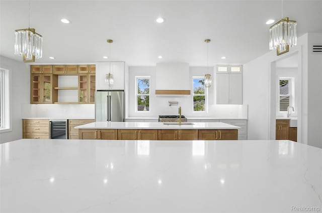 4112 Elmhurst Ave, Royal Oak, MI 48073 - kitchen featuring high end refrigerator, a sink, a chandelier, open shelves, and wine cooler