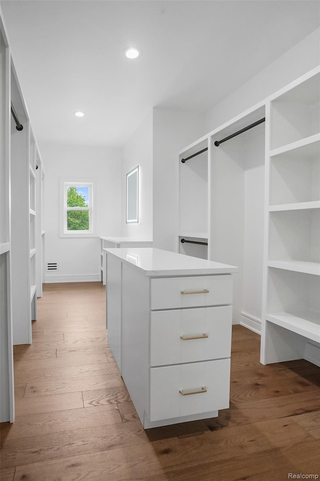 4112 Elmhurst Ave, Royal Oak, MI 48073 - walk in closet featuring wood-type flooring