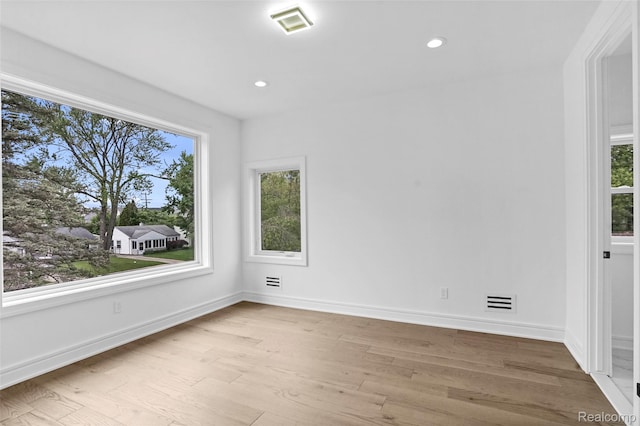 4112 Elmhurst Ave, Royal Oak, MI 48073 - empty room with wood finished floors, recessed lighting, and baseboards