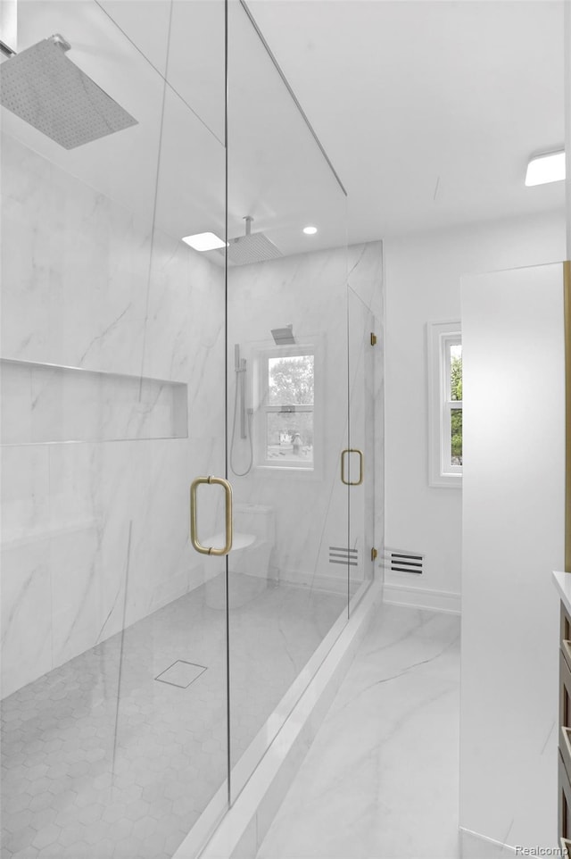 4112 Elmhurst Ave, Royal Oak, MI 48073 - bathroom featuring marble look tiles, a marble finish shower, vanity, and baseboards