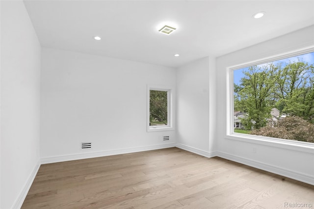 4112 Elmhurst Ave, Royal Oak, MI 48073 - unfurnished room with light wood-style floors, baseboards, and recessed lighting