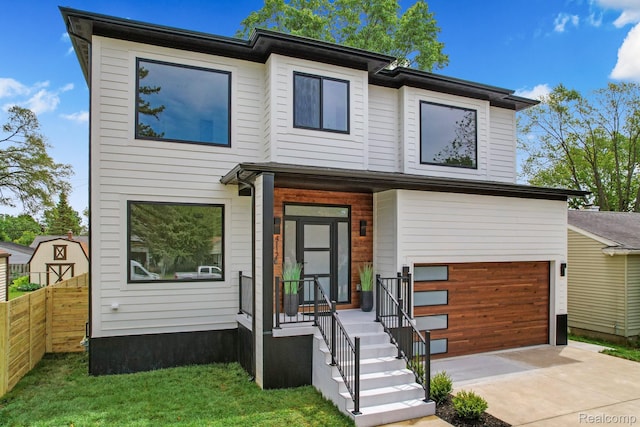 4112 Elmhurst Ave, Royal Oak, MI 48073 - contemporary home with driveway and an attached garage