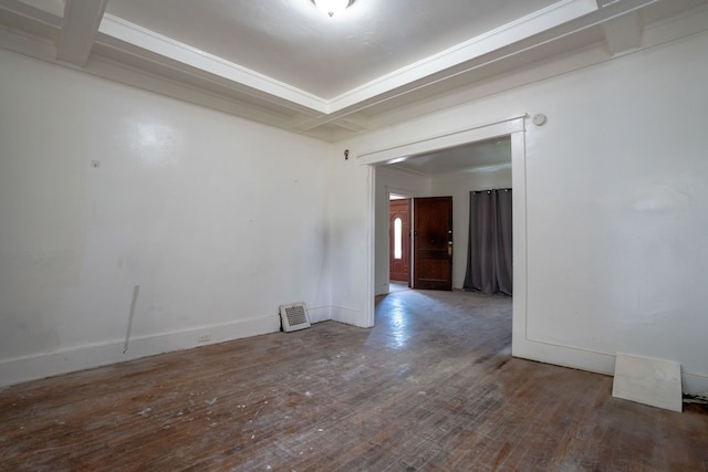 unfurnished room with wood-type flooring and baseboards