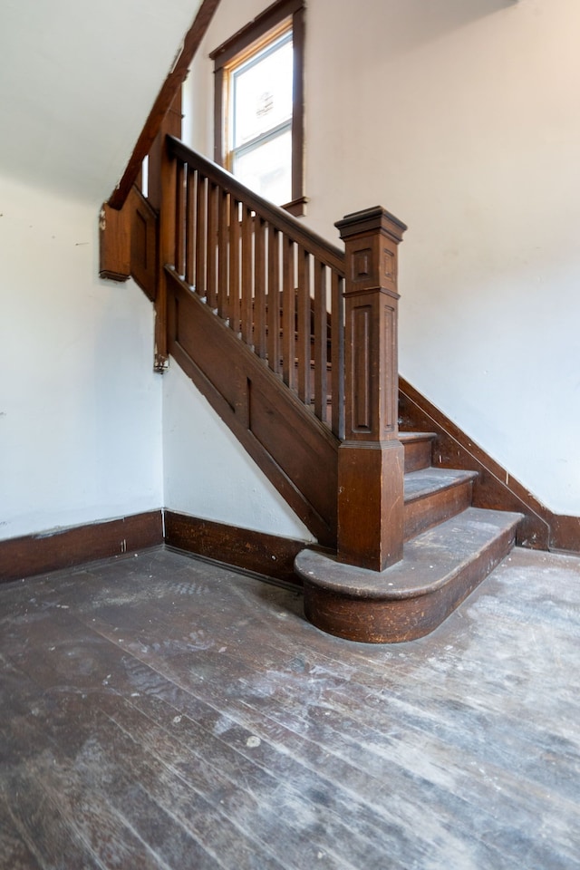 stairway with baseboards