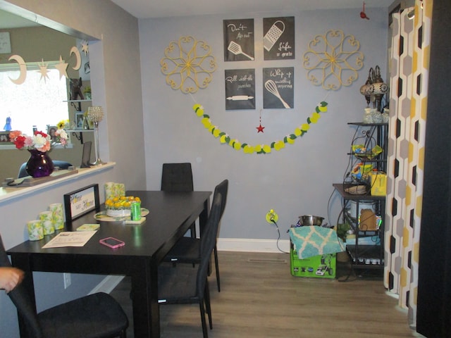 7140 Ridgedale Ln, Lambertville, MI 48144 - dining area with wood finished floors and baseboards