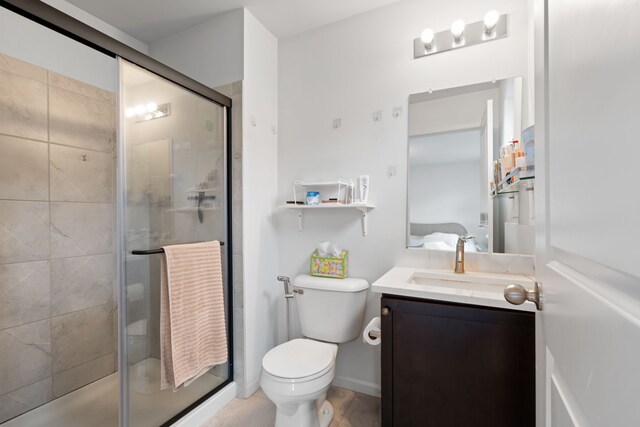 1071 N Sherman Dr Unit B, Royal Oak, MI 48067 - full bath featuring a stall shower, toilet, and vanity