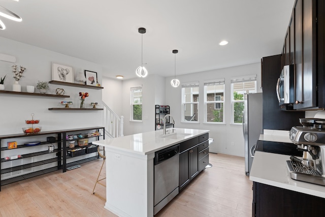 1071 N Sherman Dr Unit B, Royal Oak, MI 48067 - kitchen featuring stainless steel appliances, a sink, light countertops, light wood finished floors, and recessed lighting