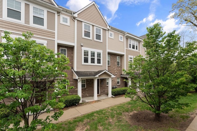 1071 N Sherman Dr Unit B, Royal Oak, MI 48067 - view of front facade featuring brick siding