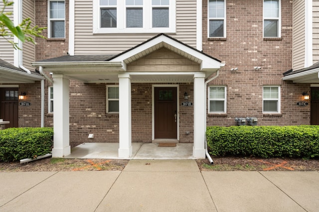1071 N Sherman Dr Unit B, Royal Oak, MI 48067 - view of exterior entry featuring brick siding