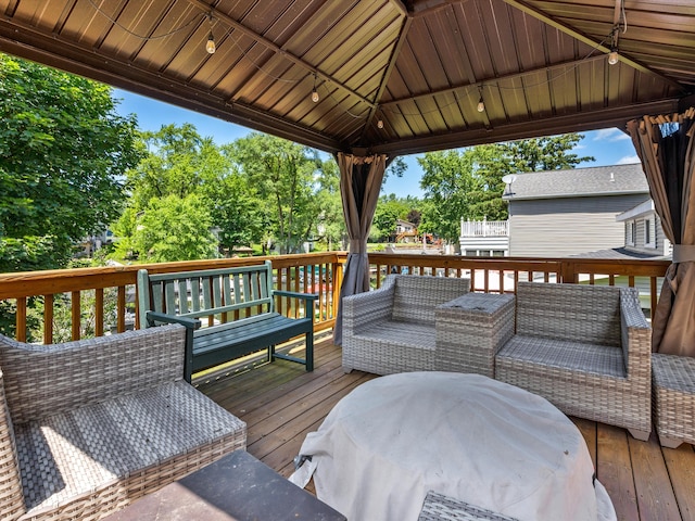 3097 Lansdowne Rd, Waterford, MI 48329 - wooden deck featuring outdoor lounge area and a gazebo