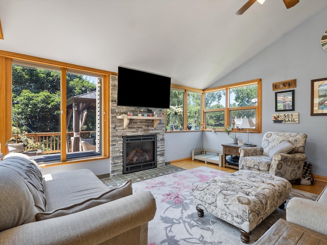 3097 Lansdowne Rd, Waterford, MI 48329 - living area featuring wood finished floors, healthy amount of natural light, vaulted ceiling, and ceiling fan