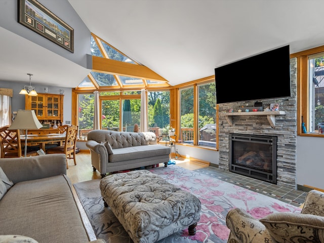 3097 Lansdowne Rd, Waterford, MI 48329 - living area featuring high vaulted ceiling and a fireplace
