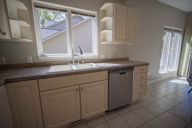 16018 Moran Dr, Linden, MI 48451 - kitchen with open shelves, stainless steel dishwasher, a sink, light tile patterned floors, and white cabinetry