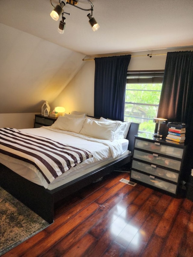 2713 Trowbridge St, Hamtramck, MI 48212 - bedroom with hardwood / wood-style flooring and lofted ceiling