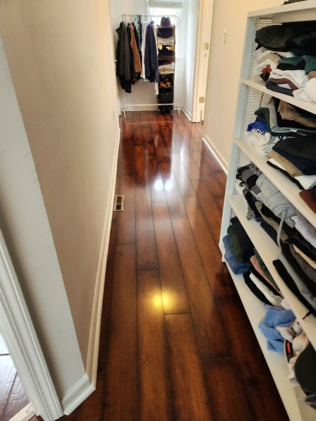 2713 Trowbridge St, Hamtramck, MI 48212 - corridor with dark wood-style flooring and baseboards