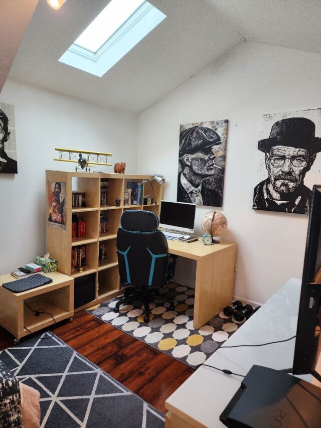 2713 Trowbridge St, Hamtramck, MI 48212 - home office featuring a skylight, wood finished floors, and vaulted ceiling