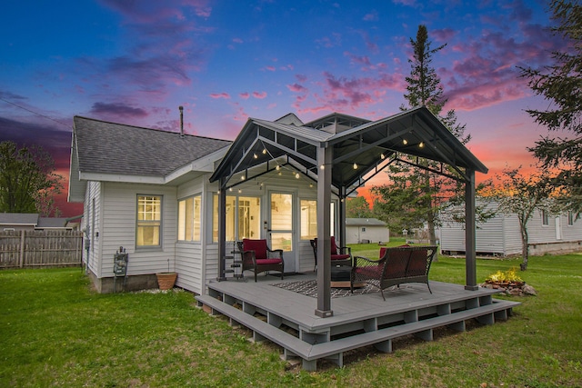 116 Alma Ln, Houghton Lake, MI 48629 - rear view of property with a deck and a shingled roof