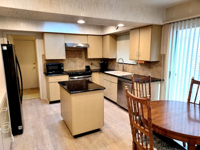 7215 Suncrest Rd, West Bloomfield, MI 48322 - kitchen with black appliances, a sink, under cabinet range hood, backsplash, and light wood-style flooring