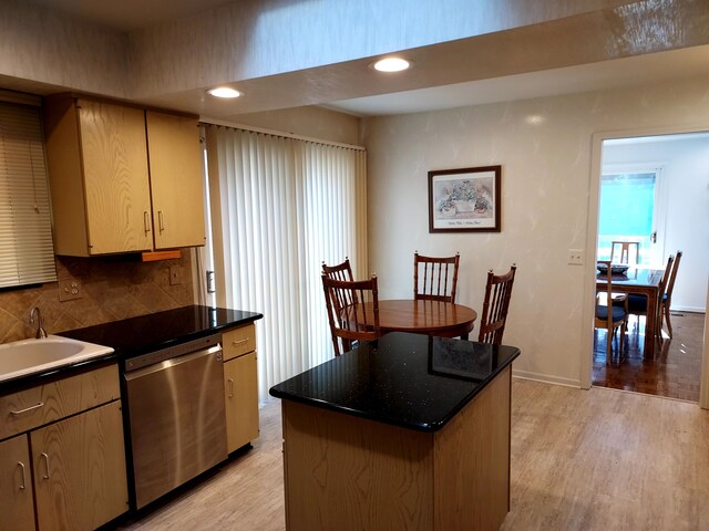 7215 Suncrest Rd, West Bloomfield, MI 48322 - kitchen featuring dishwasher, a sink, light wood-style floors, a center island, and recessed lighting