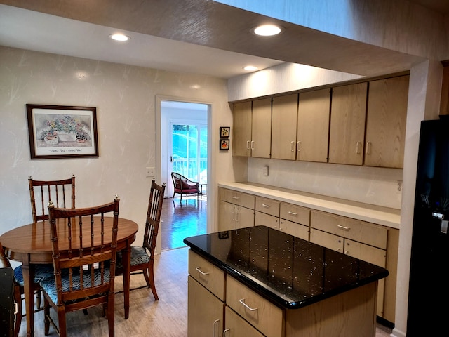 7215 Suncrest Rd, West Bloomfield, MI 48322 - kitchen with light wood finished floors, a kitchen island, recessed lighting, and freestanding refrigerator