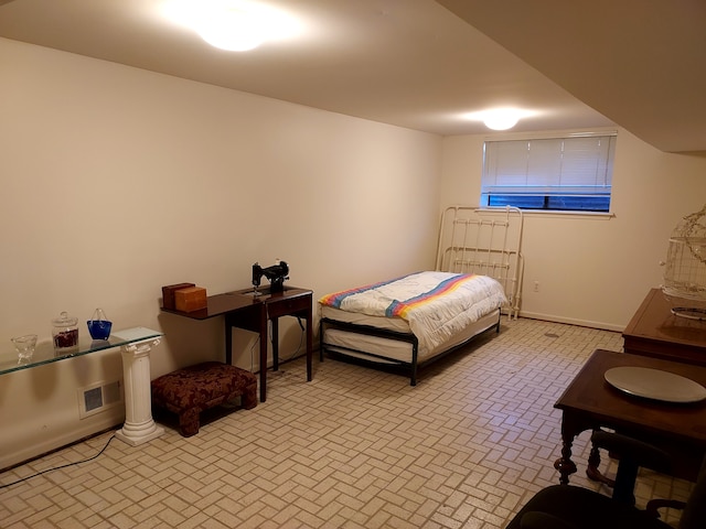 7215 Suncrest Rd, West Bloomfield, MI 48322 - bedroom featuring brick patterned floors and baseboards