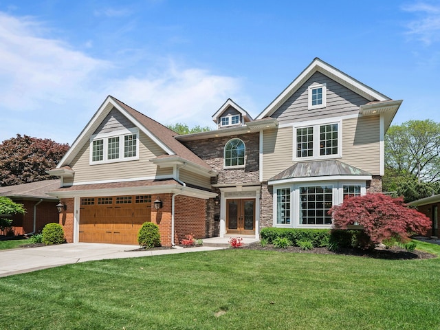 680 Pear Tree Ln, Grosse Pointe Woods, MI 48236 - view of front of property featuring french doors, stone siding, an attached garage, and driveway