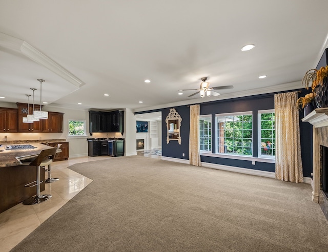 680 Pear Tree Ln, Grosse Pointe Woods, MI 48236 - living room with a lit fireplace, ornamental molding, recessed lighting, a ceiling fan, and baseboards