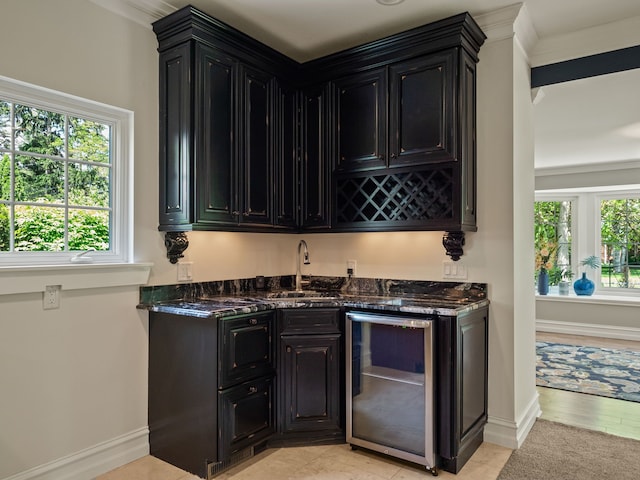 680 Pear Tree Ln, Grosse Pointe Woods, MI 48236 - indoor wet bar with wine cooler, crown molding, and baseboards
