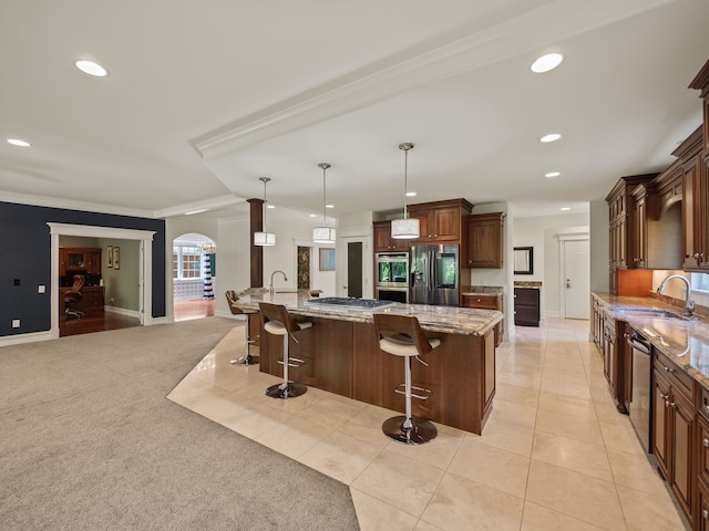 680 Pear Tree Ln, Grosse Pointe Woods, MI 48236 - kitchen featuring appliances with stainless steel finishes, a sink, a breakfast bar area, ornamental molding, and recessed lighting