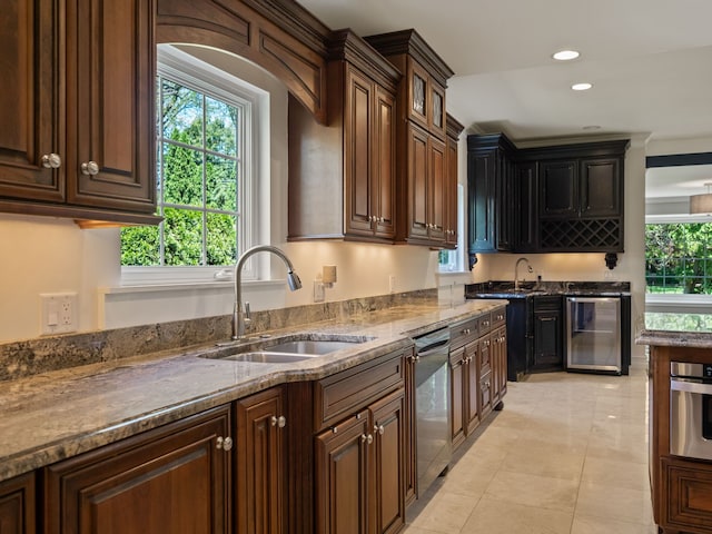 680 Pear Tree Ln, Grosse Pointe Woods, MI 48236 - kitchen featuring a sink, beverage cooler, stainless steel appliances, recessed lighting, and dark stone countertops
