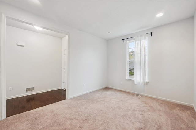 3236 Curtis, Wixom, MI 48393 - carpeted empty room featuring baseboards and recessed lighting