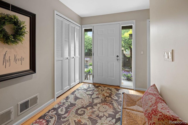 5117 Woodview Ct, Dearborn, MI 48126 - entrance foyer with light wood-type flooring and baseboards