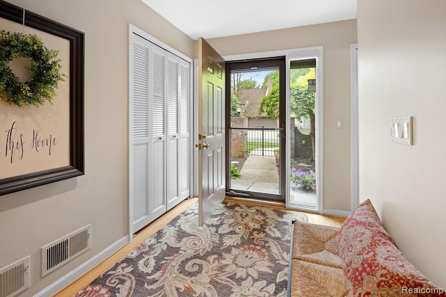 5117 Woodview Ct, Dearborn, MI 48126 - foyer entrance featuring light wood finished floors and baseboards