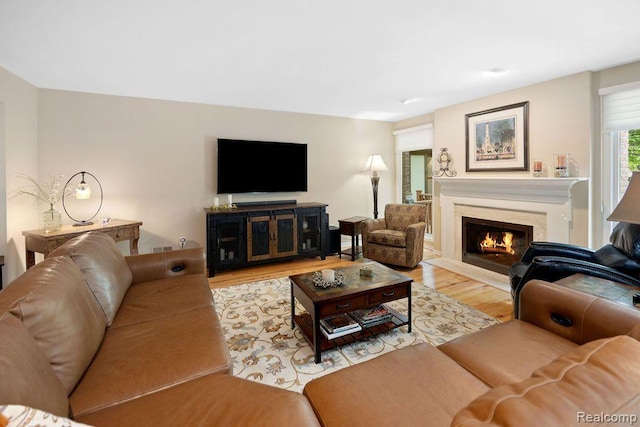 5117 Woodview Ct, Dearborn, MI 48126 - living area with wood finished floors and a premium fireplace