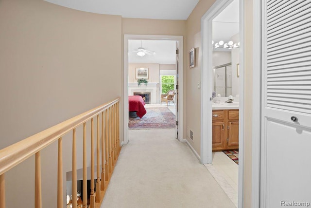 5117 Woodview Ct, Dearborn, MI 48126 - corridor with light colored carpet and a sink