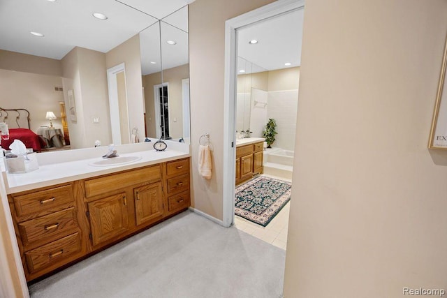 5117 Woodview Ct, Dearborn, MI 48126 - ensuite bathroom with vanity, a tub, recessed lighting, and a shower