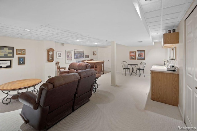 5117 Woodview Ct, Dearborn, MI 48126 - living area featuring light colored carpet, baseboards, and recessed lighting