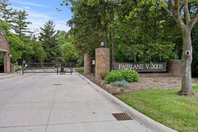 5117 Woodview Ct, Dearborn, MI 48126 - community / neighborhood sign featuring a gate