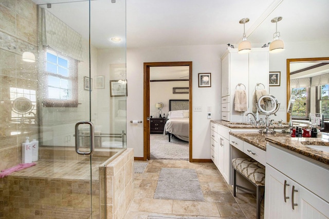 14965 Loon Lake Dr, Bellevue, MI 49021 - bathroom with healthy amount of natural light, a stall shower, vanity, and ensuite bathroom