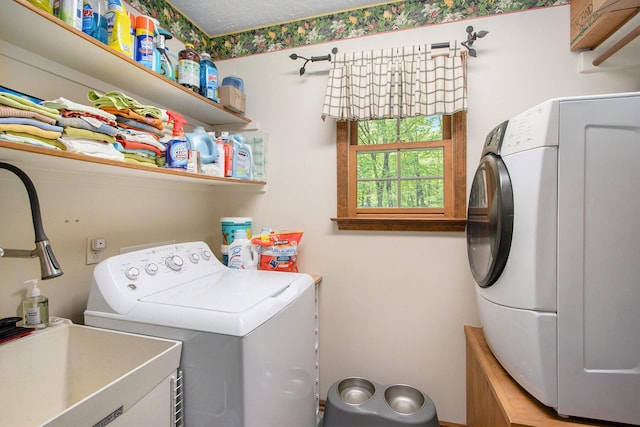 14965 Loon Lake Dr, Bellevue, MI 49021 - clothes washing area with separate washer and dryer